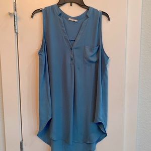 Teal sleeveless blouse